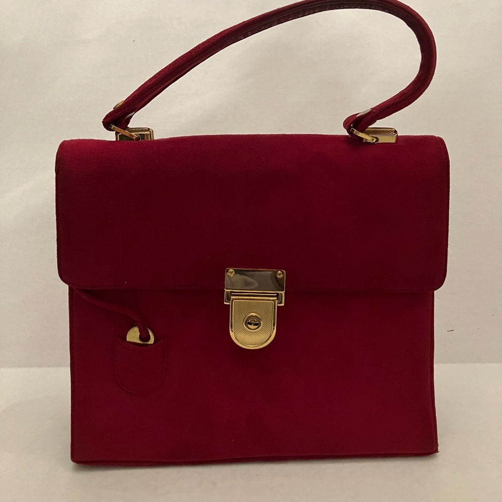 Red suede handbag